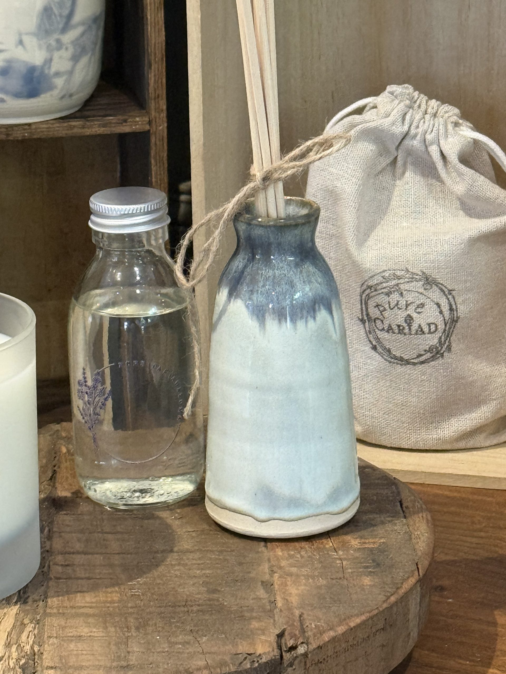 pure cariad ceramic candles and diffusers refillable refills pure essential oils wood wick soy wax rattan reeds